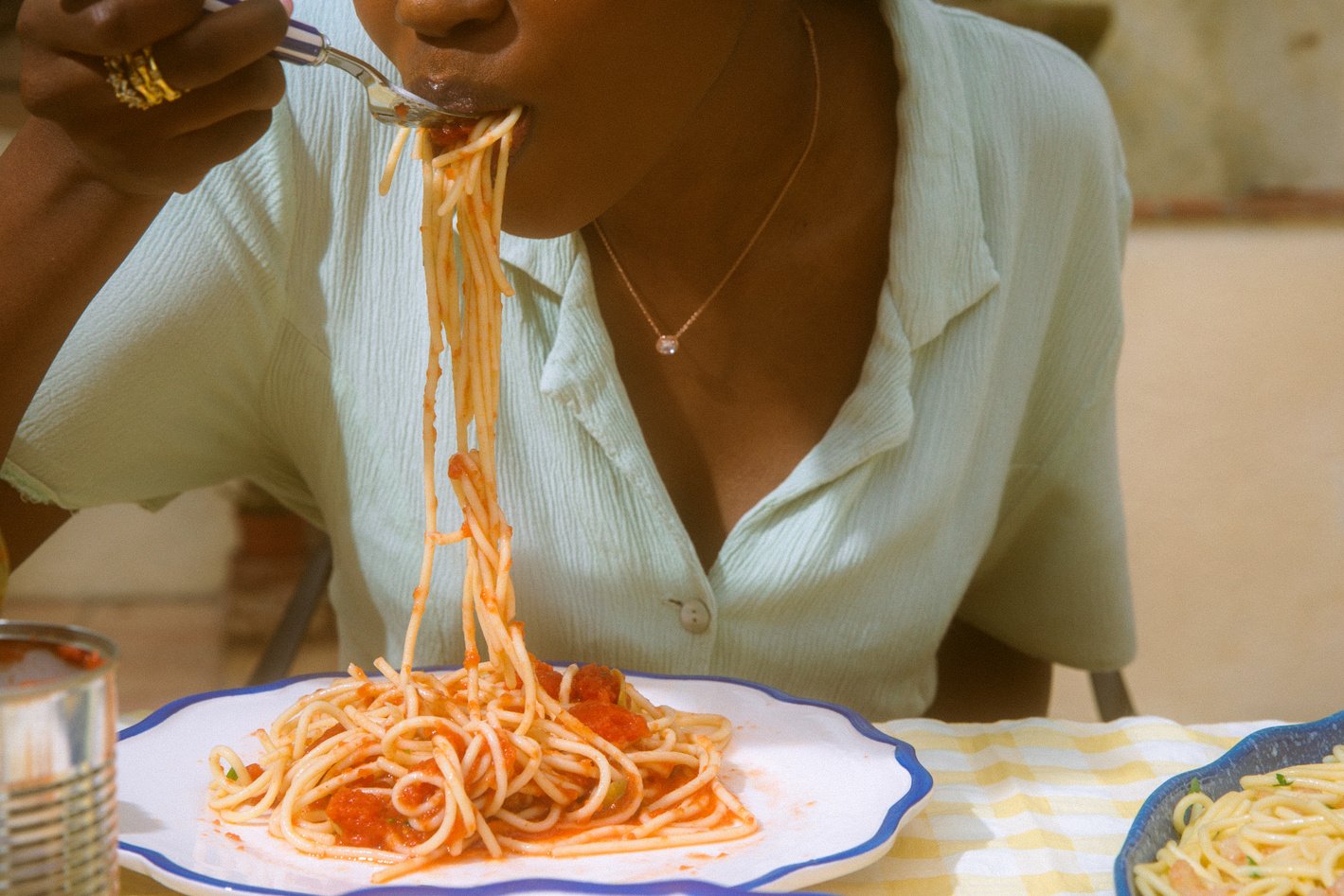 Woman Eating Pasta